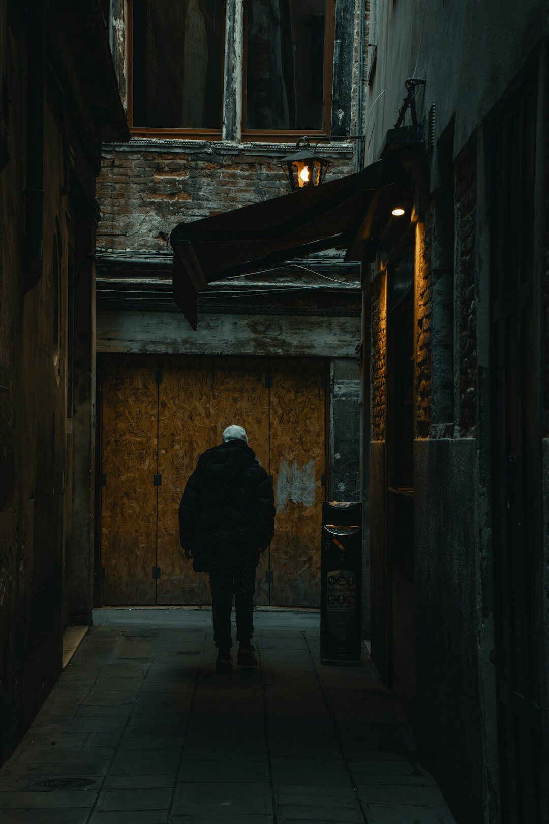 shadowy figure in alley